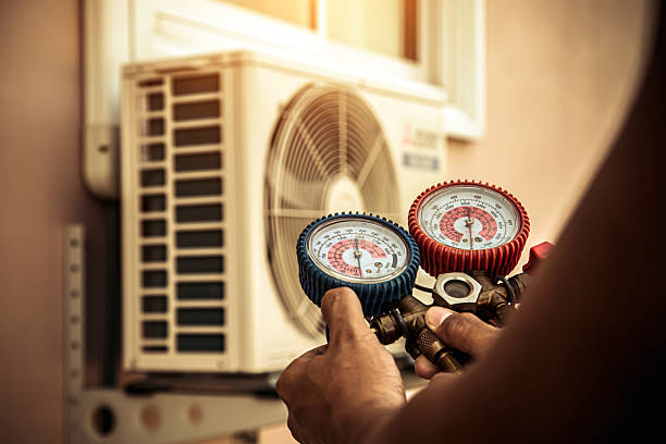 Professional Heat Pump Repair technician working in Pacoima, CA